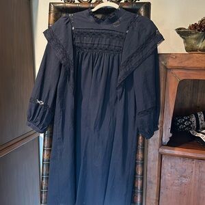 Never worn linen dress with lace cut outs by Anthropology